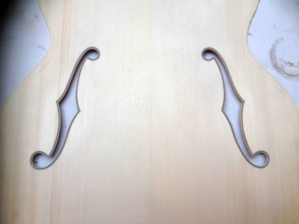 F-holes cut in European spruce top