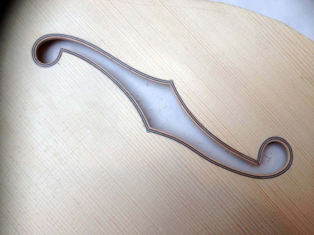 F-holes bound with maple