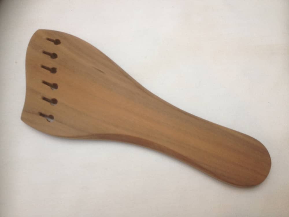 Rosewood tailpiece carved