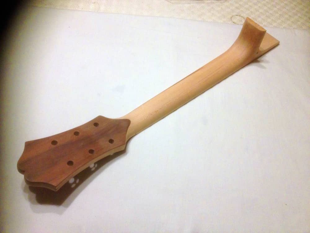 Handcarved maple neck