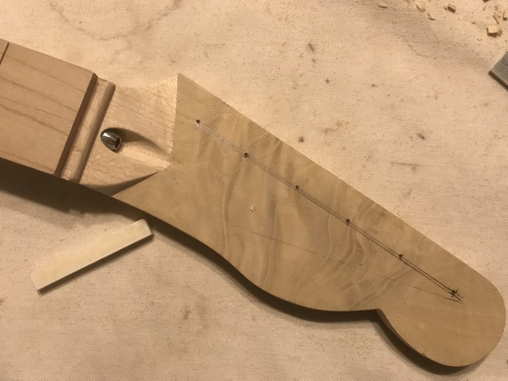 Ash burr headstock veneer & bone nut