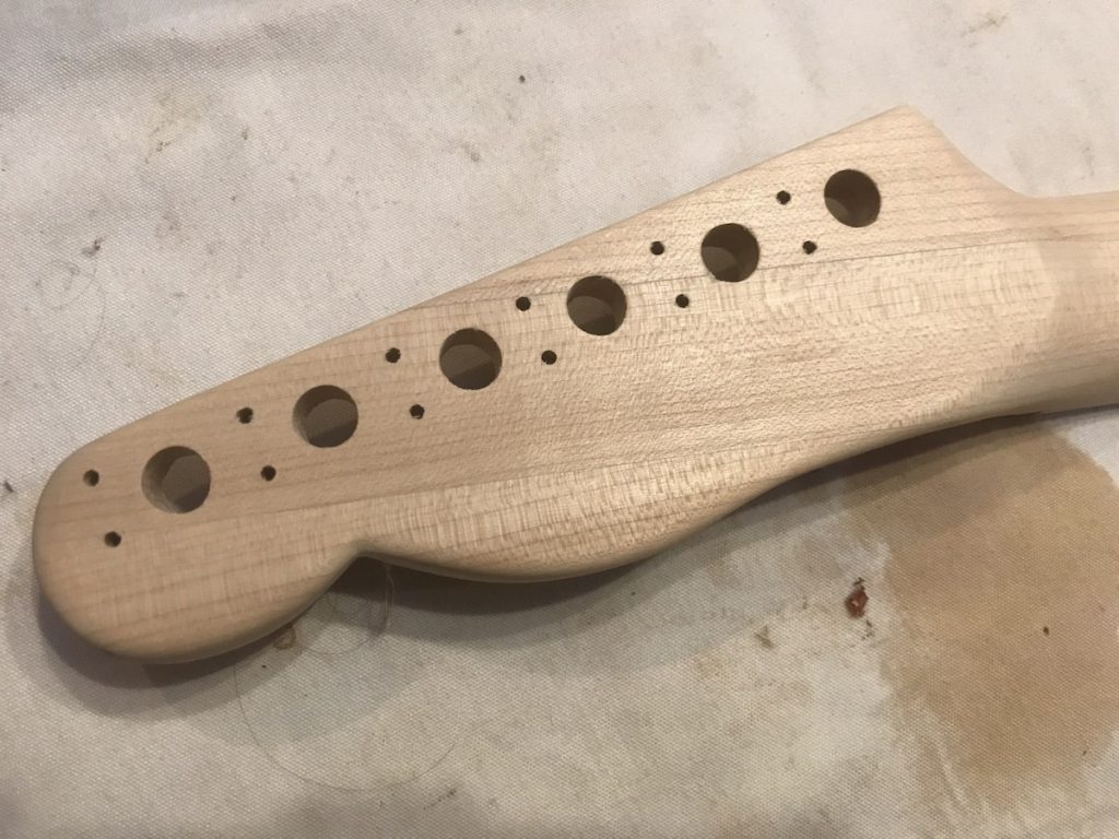 Holes for tuners