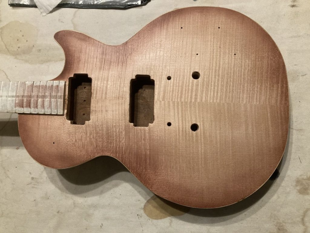 Airbrushed burst to top